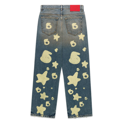 Blue denim pants with light yellow Beluga stamp and star designs, red leather back patch.