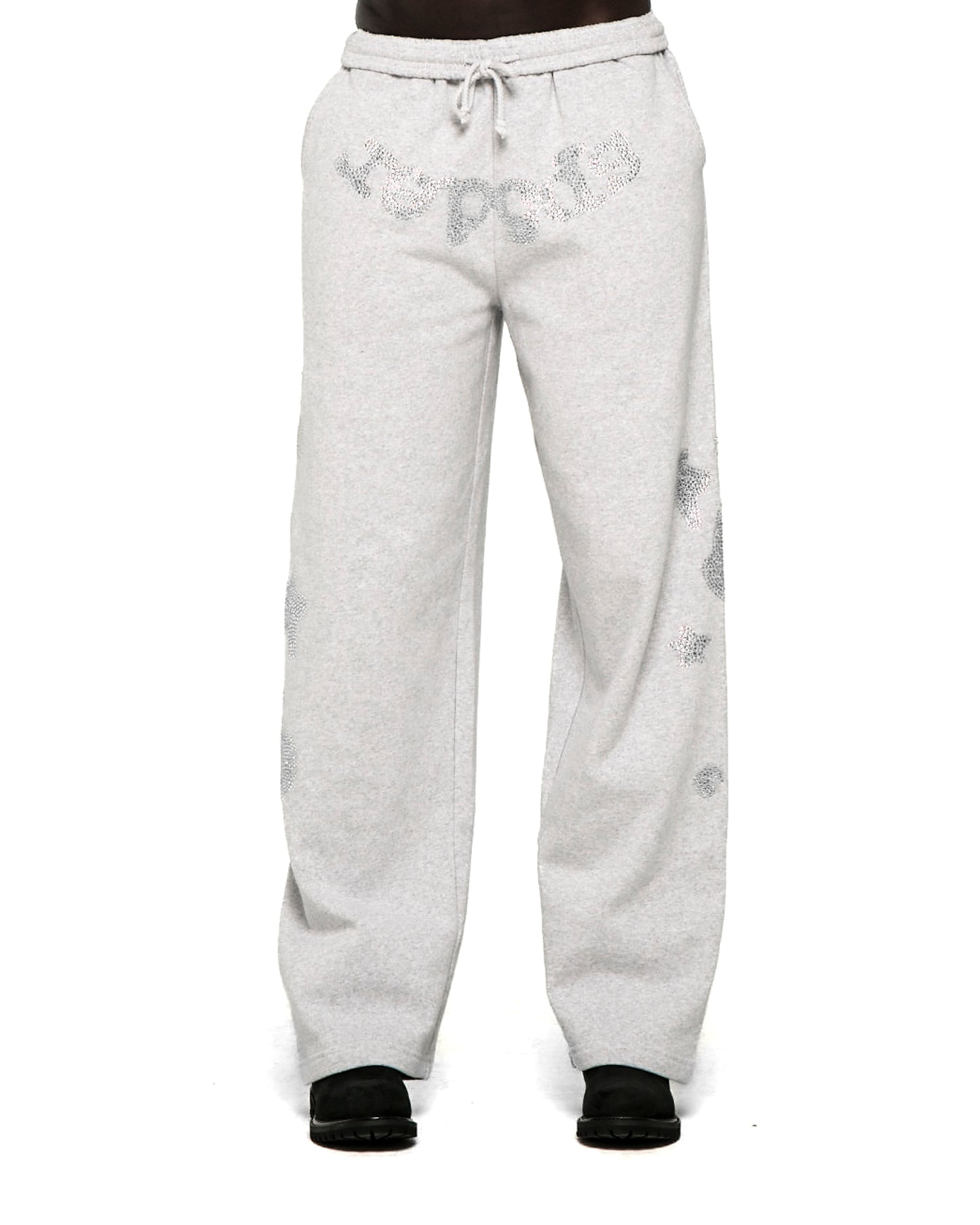 Light gray wide-leg sweatpants with rhinestone "SP5DER" text at crotch and "5" and star designs.