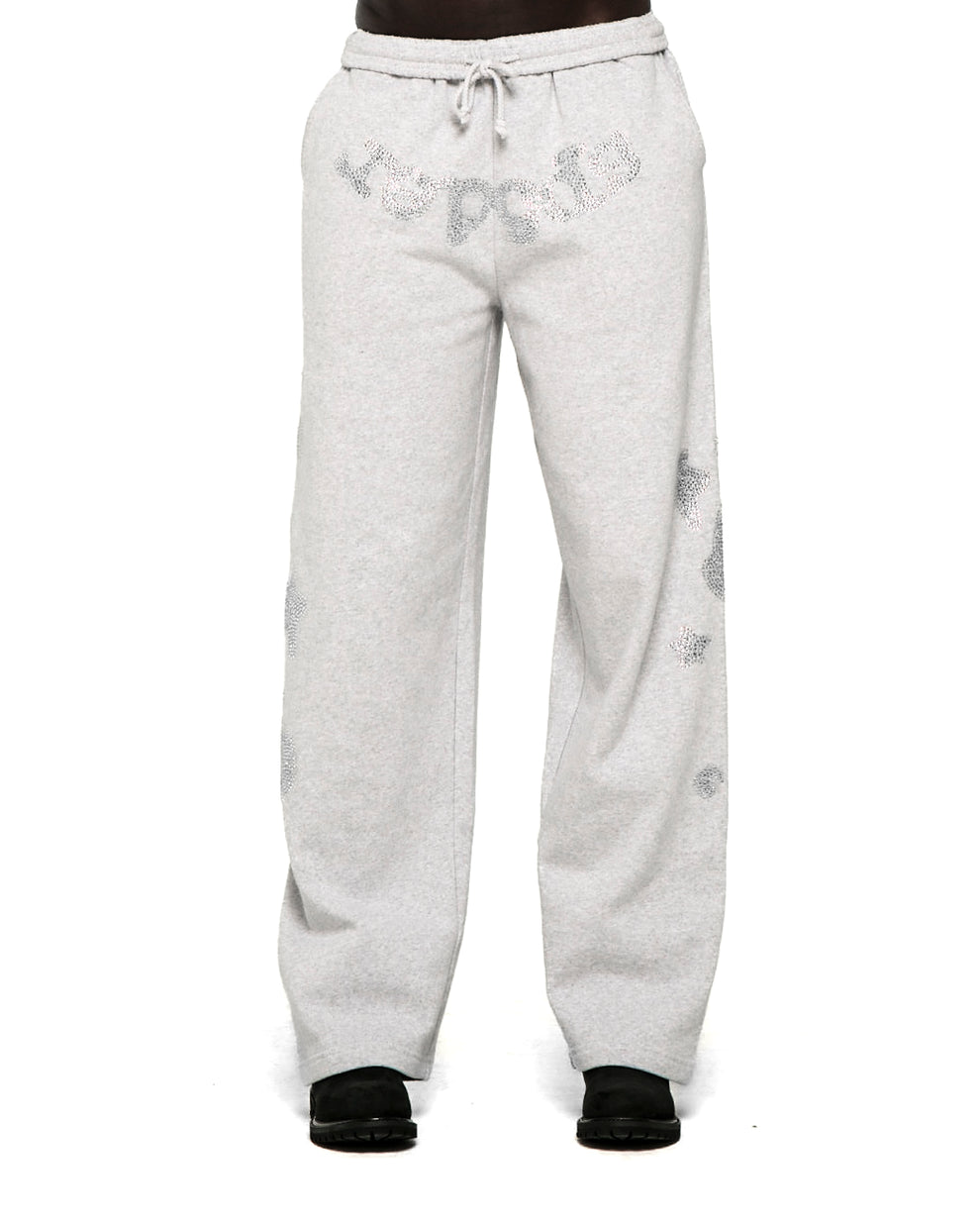 Light gray wide-leg sweatpants with rhinestone "SP5DER" text at crotch and "5" and star designs.