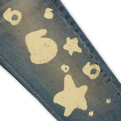 BELUGA STAMP DENIM blue jeans with unique light yellow stamp designs and a classic straight leg fit.