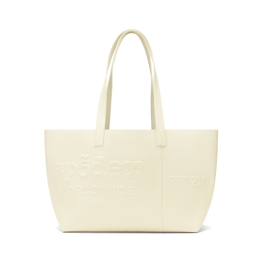 Ghost leather tote bag with embossed logo, "EST. 2019" detail, and dual shoulder straps.