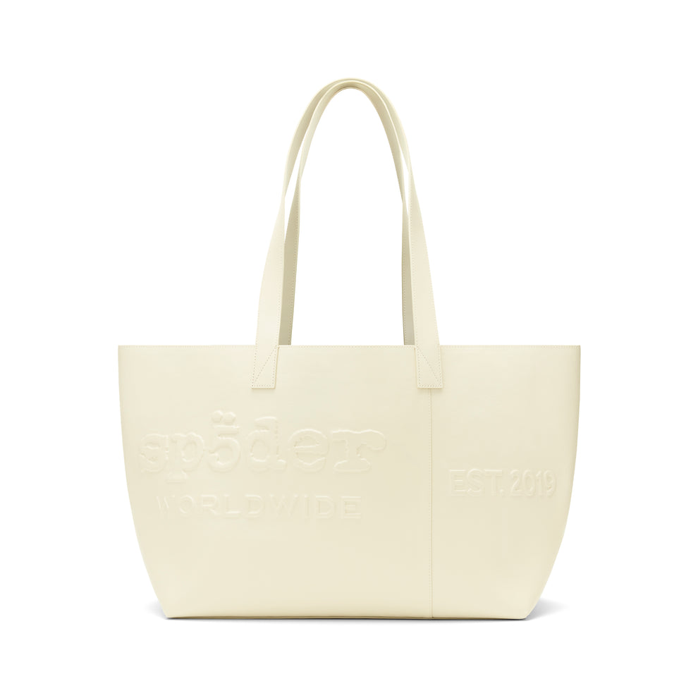 Ghost leather tote bag with embossed logo, "EST. 2019" detail, and dual shoulder straps.