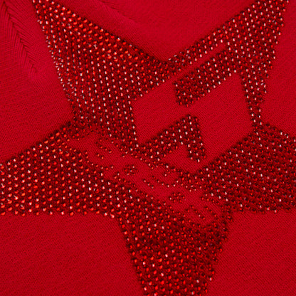 Red acrylic skully with a large, sparkly red rhinestone 5-star design.