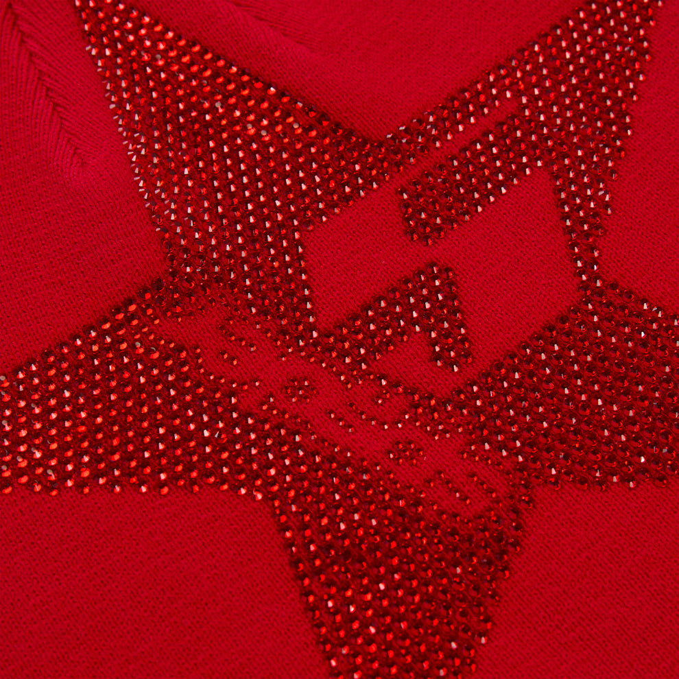 Red acrylic skully with a large, sparkly red rhinestone 5-star design.