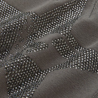 Gray acrylic skully with a sparkling rhinestone 5-star design.