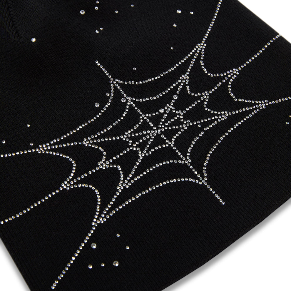 Black acrylic beanie with a rhinestone spiderweb design and scattered rhinestones.