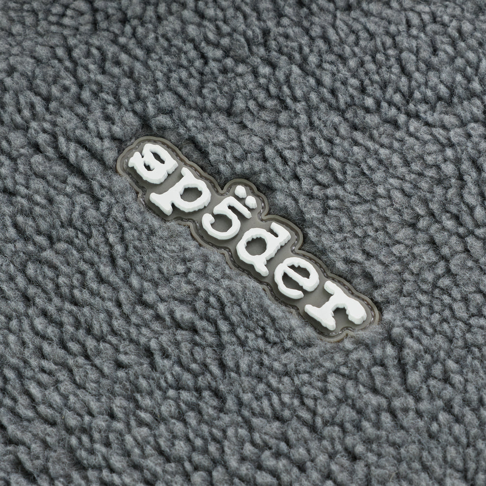 Gray sherpa fleece with a rubberized "ep5der" logo patch.