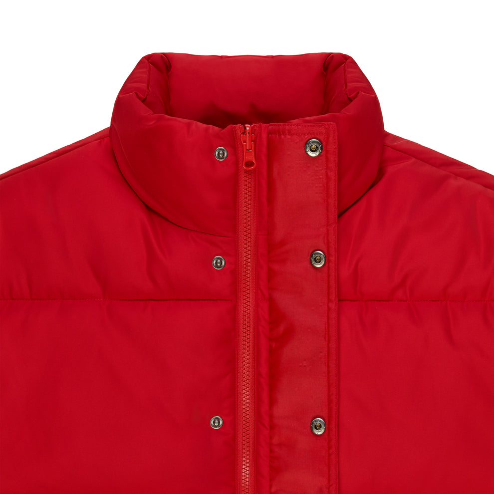 Red TRACKHAWK puffer jacket with poly-fill, front zip, and snap placket.