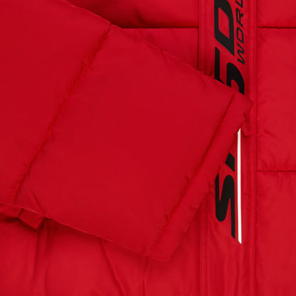 Red poly-fill puffer jacket with black reflective text graphic along the front placket.