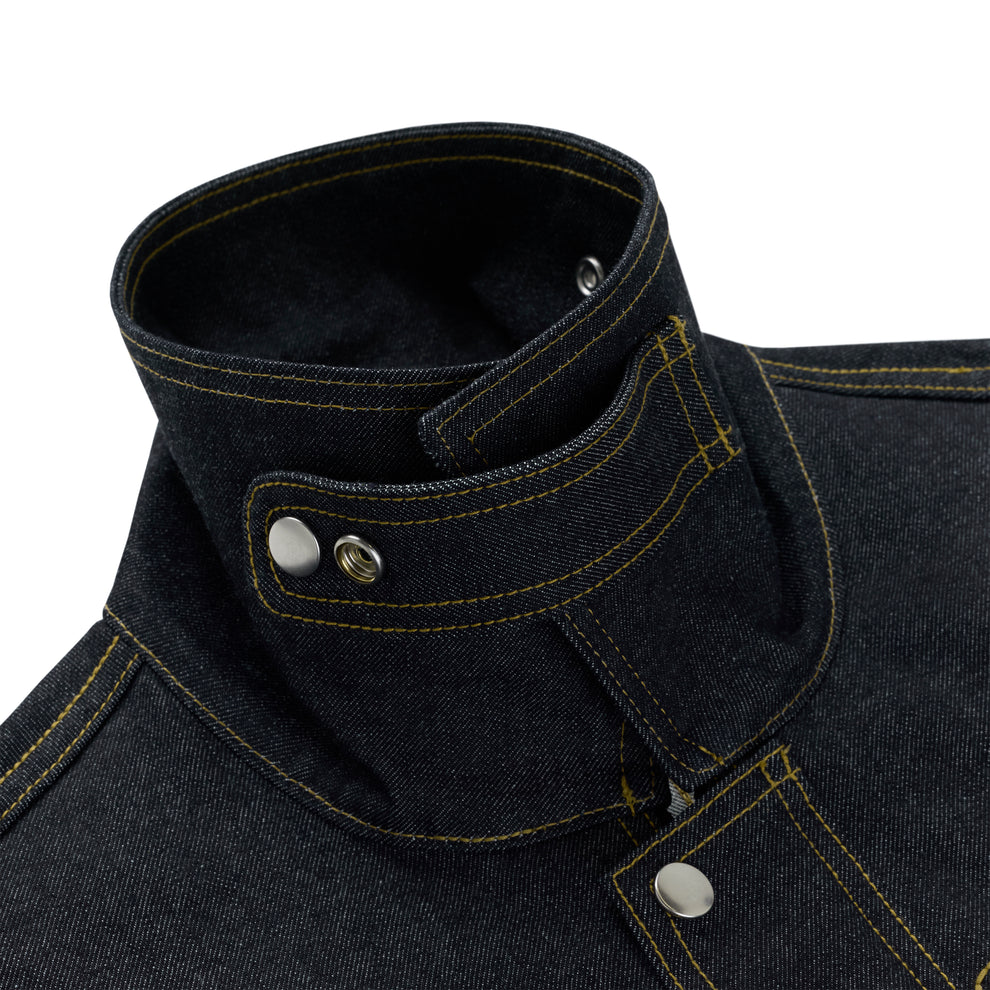 Dark wash denim jacket collar with yellow stitching, snap buttons, and stand/fold design.