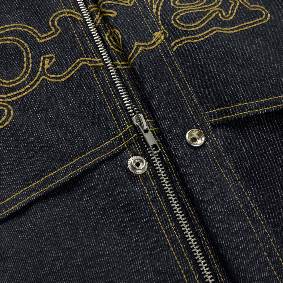 Dark wash denim jacket with yellow stitching, silver zipper, and snap buttons.