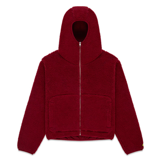 Red teddy sherpa fleece zip-up hooded jacket with welt pockets and rubberized logo patch.