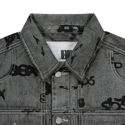 Gray denim trucker jacket with black all-over print, spread collar, silver buttons, and red contrast stitching.