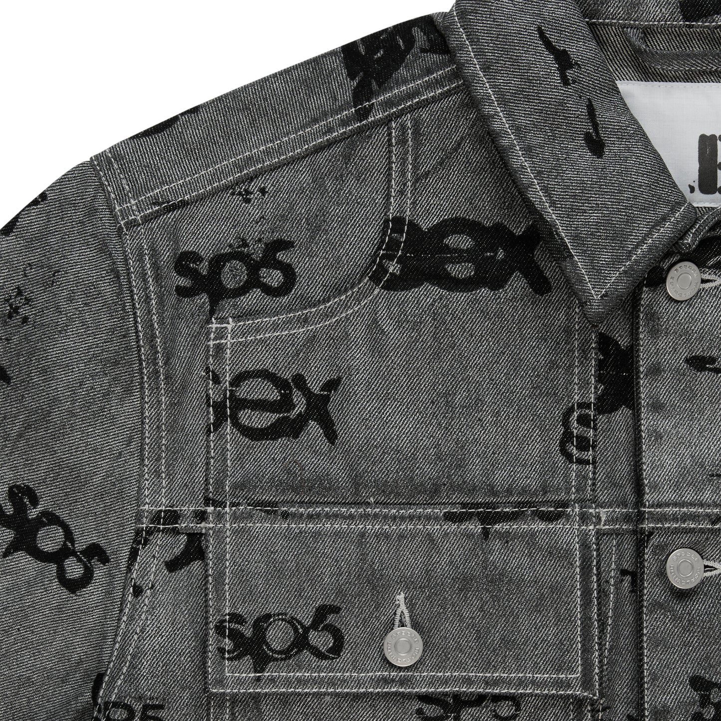 Gray denim trucker jacket with black "SEX" all-over print, silver buttons, and red contrast stitching.