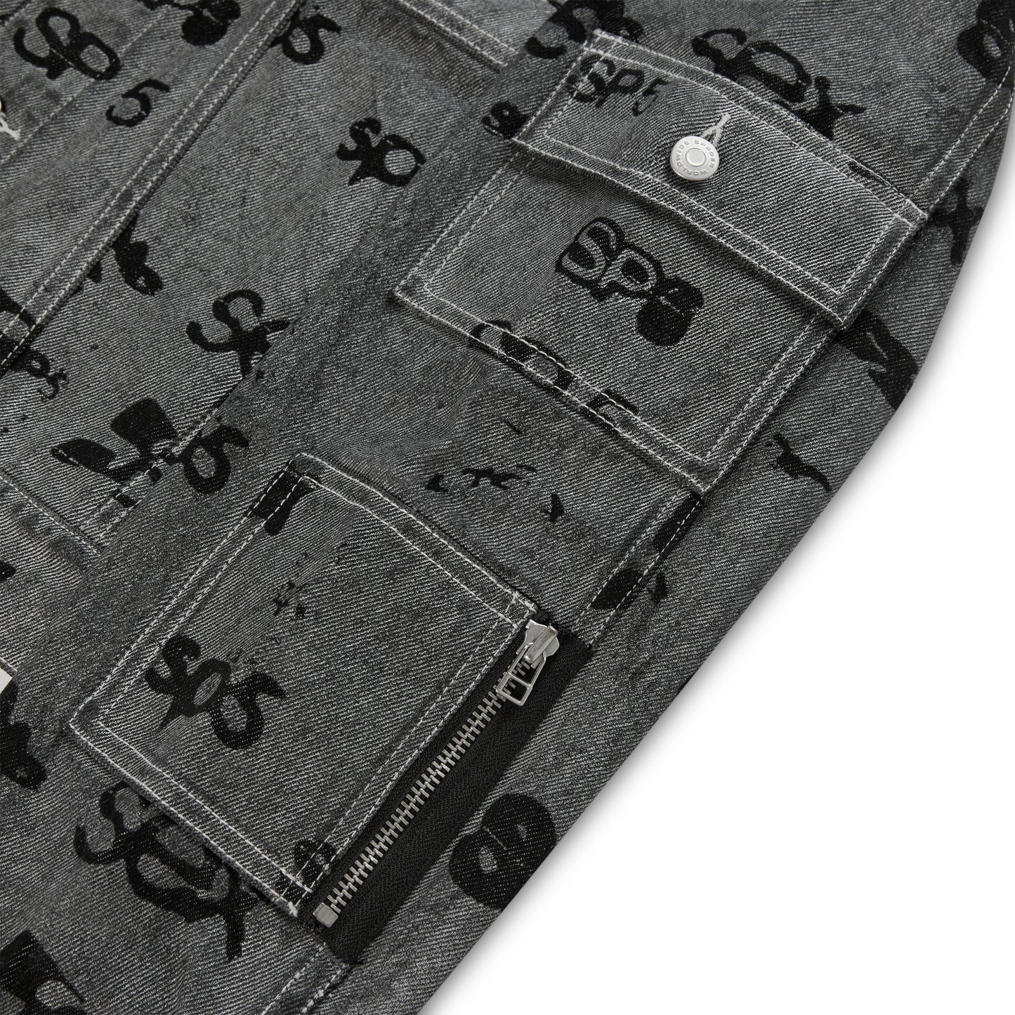 Gray denim jacket with black all-over print, flap, and zip pockets, red contrast stitching.