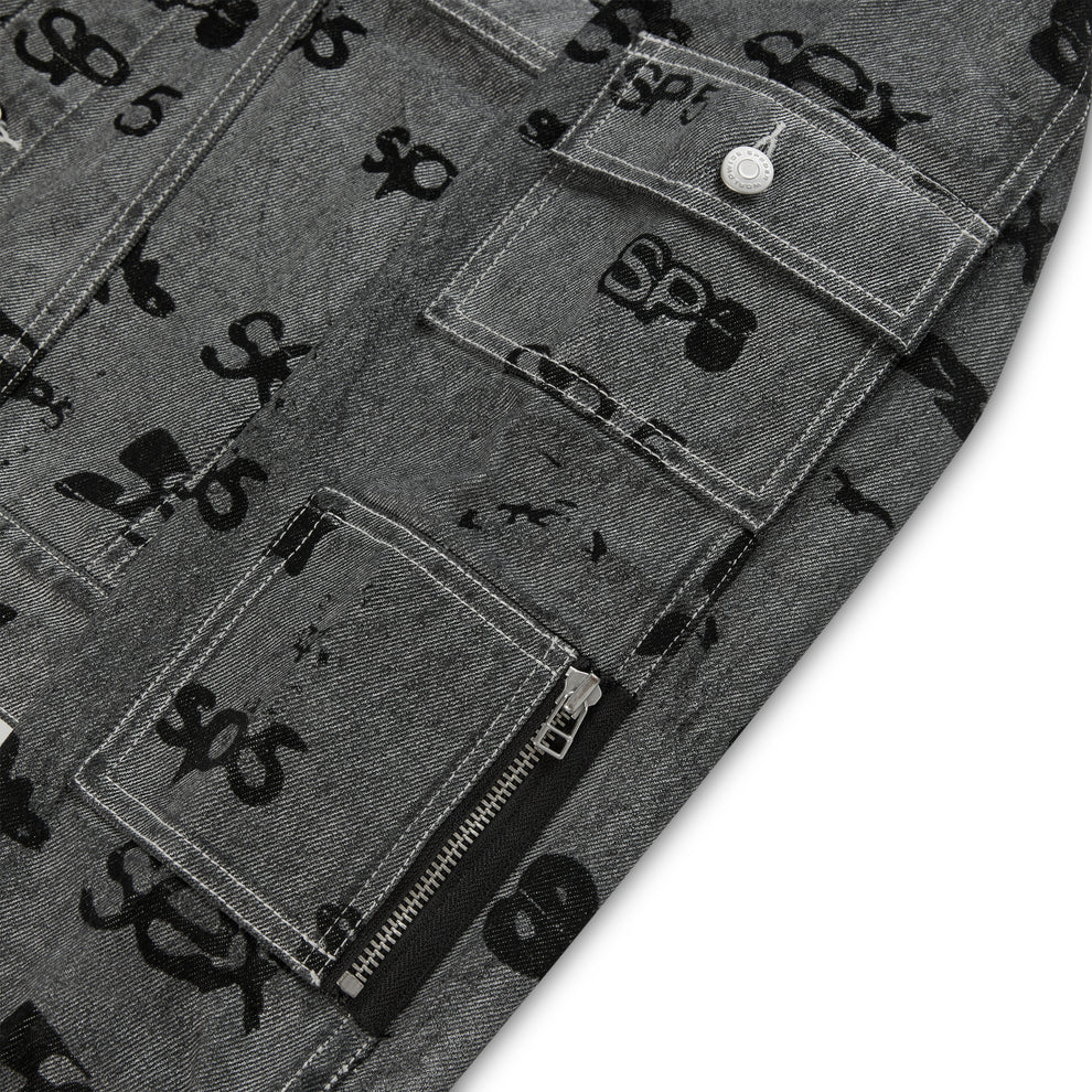 Gray denim jacket with black all-over print, flap, and zip pockets, red contrast stitching.