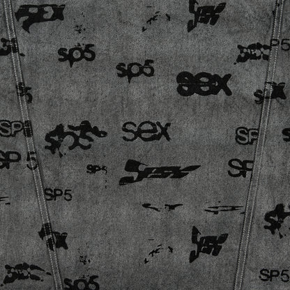 Gray denim trucker jacket with black all-over print design and red contrast stitching.