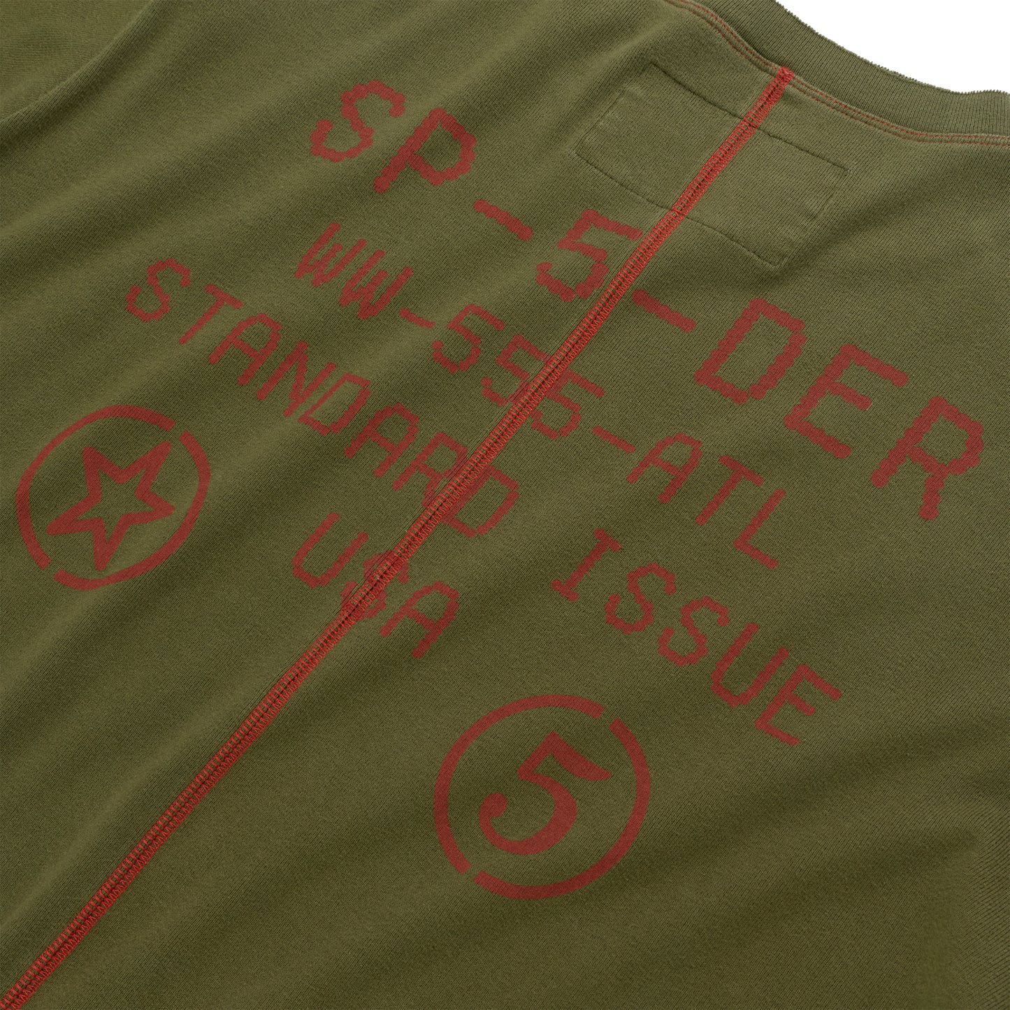 Olive green SERVICE LONGSLEEVE with red graphic print and exposed red stitching down the back.