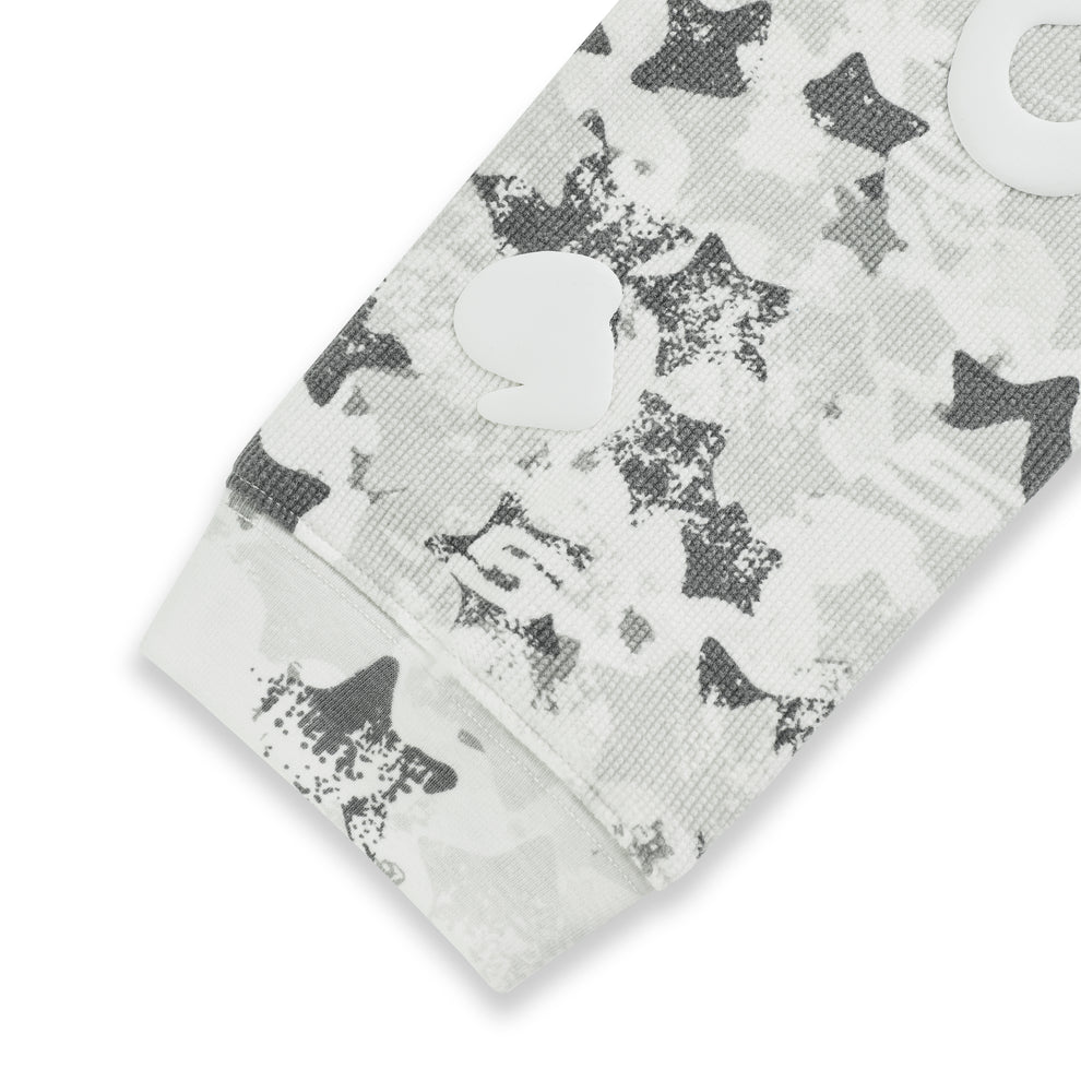BELUGA AOP thermal, waffle knit, white and gray star camo print sleeve with ribbed cuff.