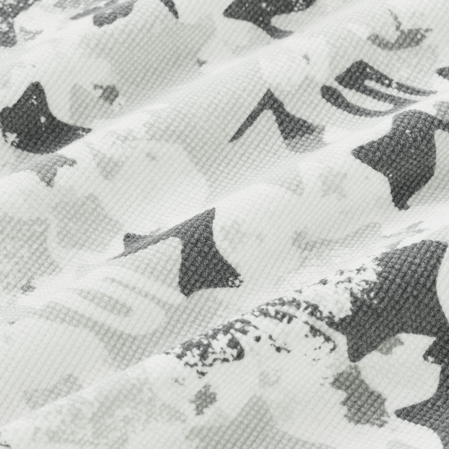BELUGA AOP Thermal: White waffle knit fabric with all-over gray star camo print.