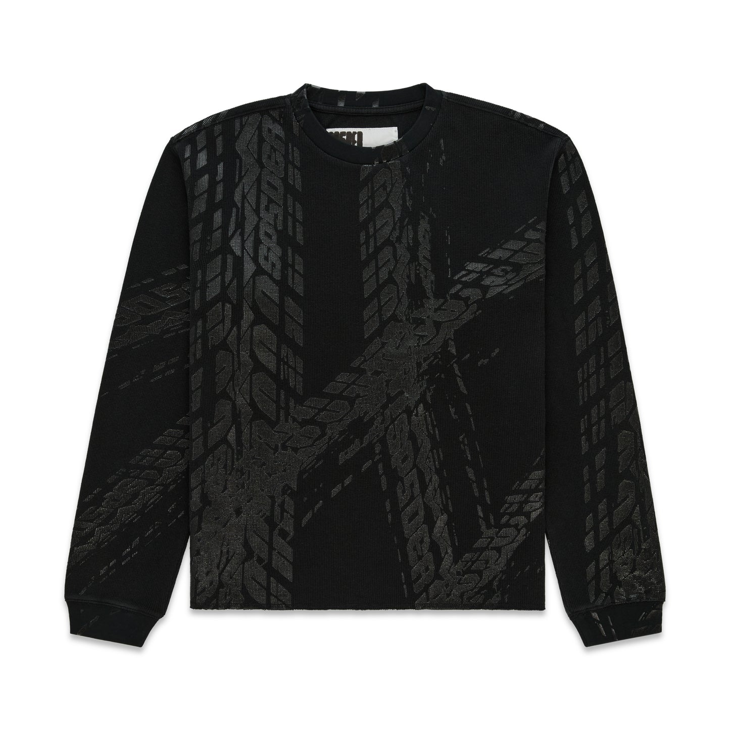 Black waffle knit thermal with ribbed collar, hem, and cuffs, featuring an all-over tire track print.