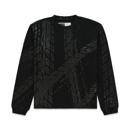 Black waffle knit thermal with ribbed collar, hem, and cuffs, featuring an all-over tire track print.