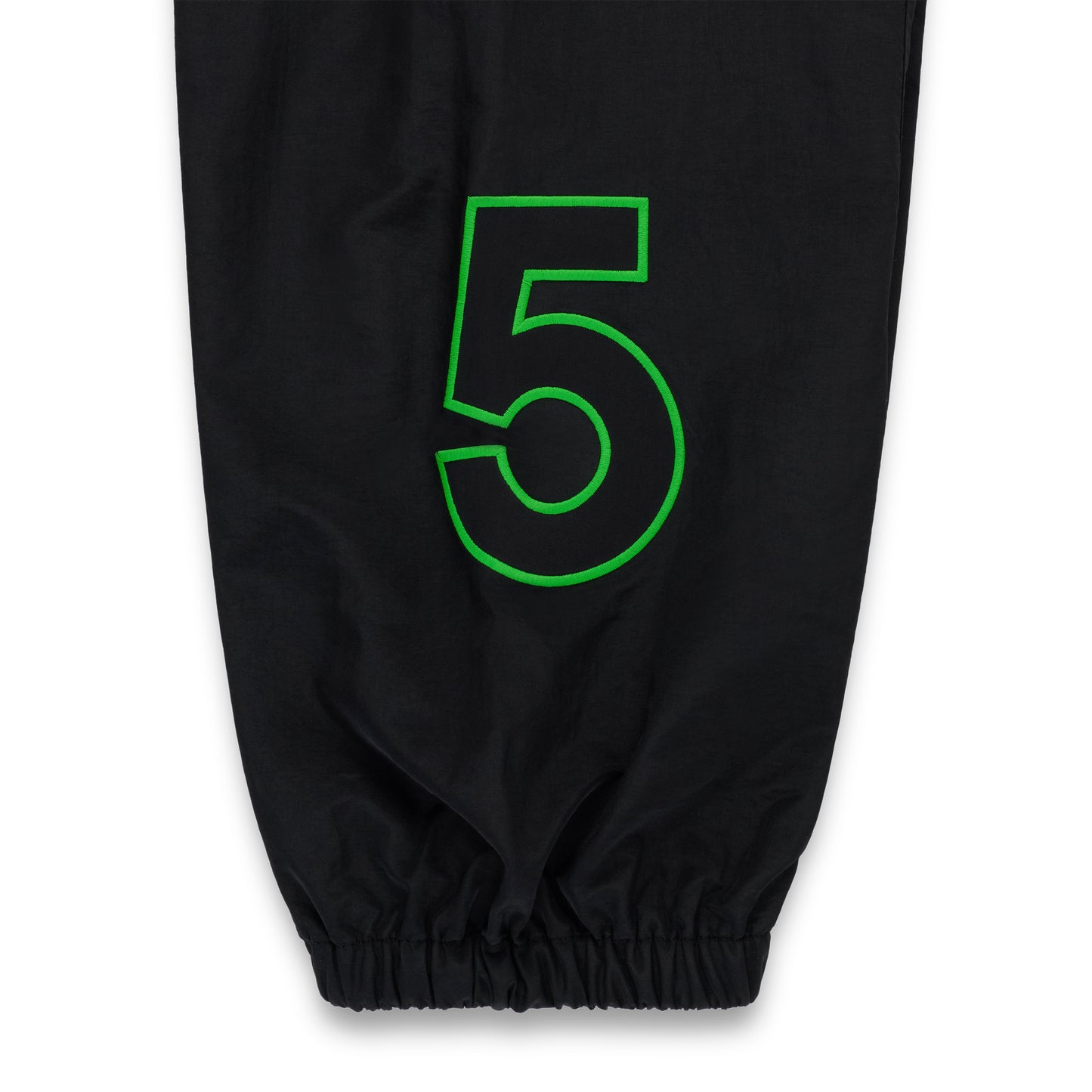 Black nylon track pant with a bright green embroidered "5" and elasticized cuff.