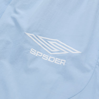 Light blue nylon track pant with white embroidered SP5DER logo and graphic.