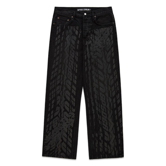 Black denim pants with all-over dark gray tire track design, five-pocket styling, and straight leg fit.