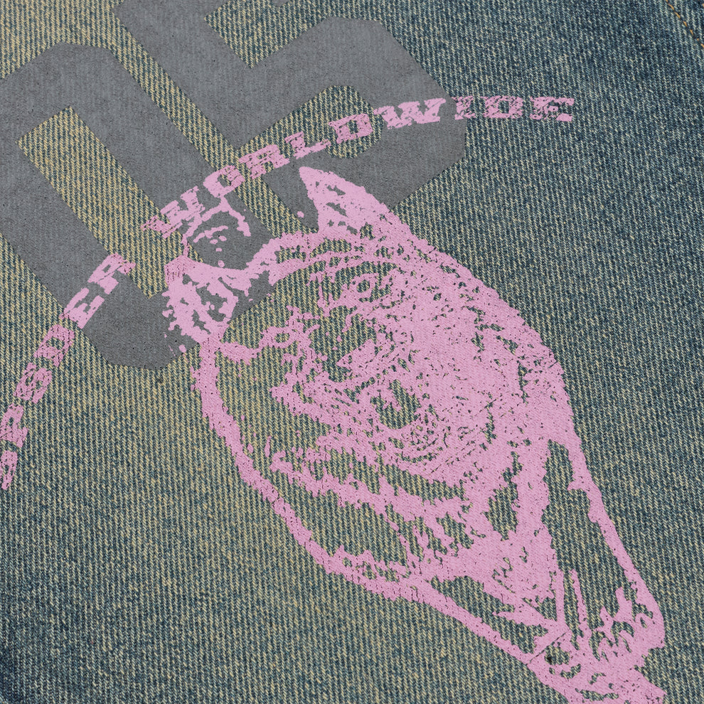 Washed blue denim jeans with a large pink graphic print and gray "WORLDWIDE" text.