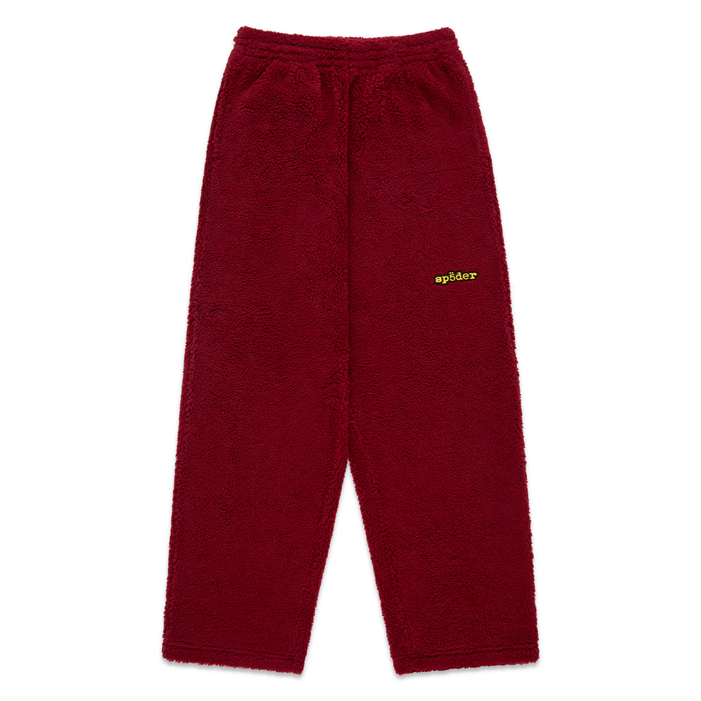 Red teddy fleece pant with elasticized waistband and yellow Sp5der logo.