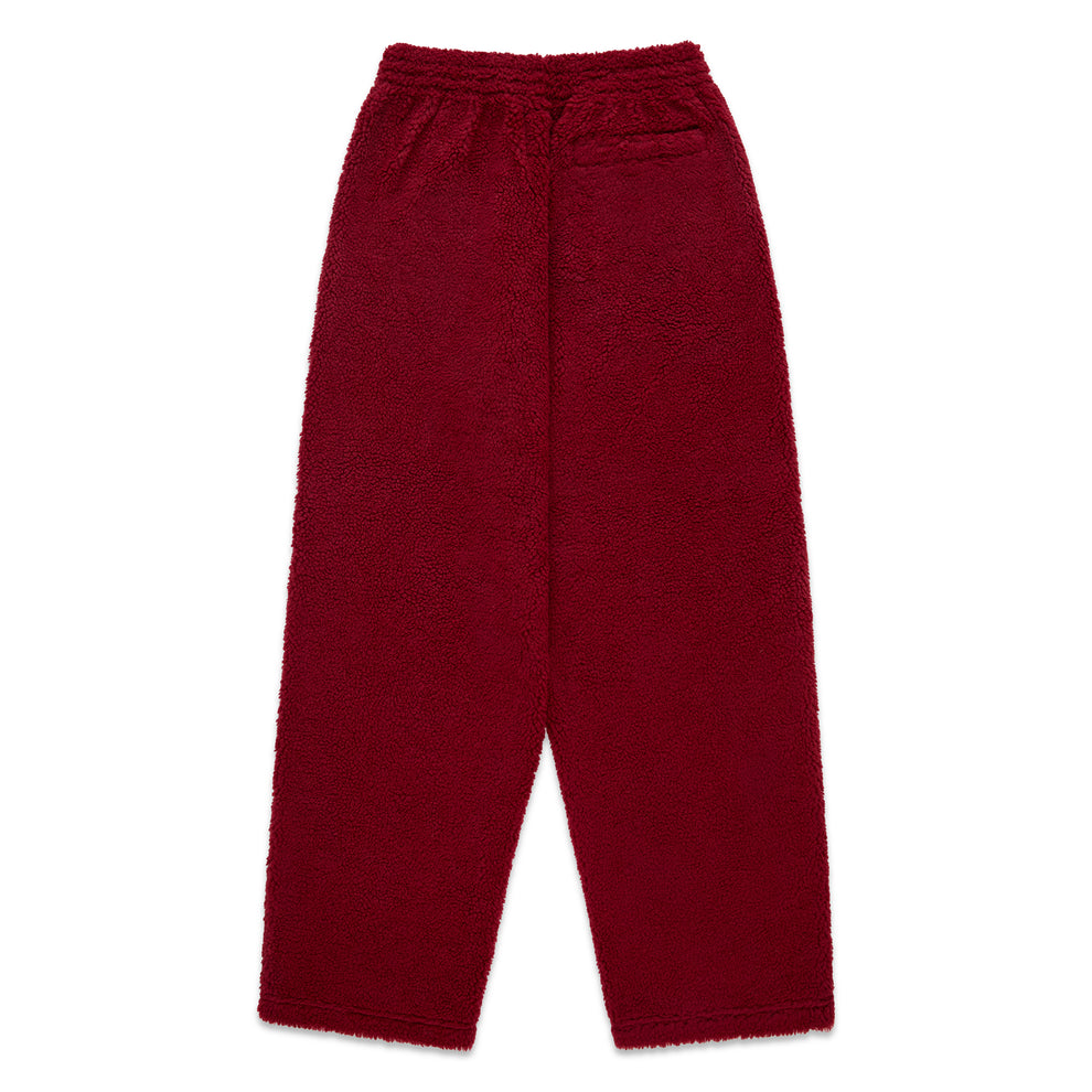 Red teddy fleece pant with elasticized waistband and straight leg fit.