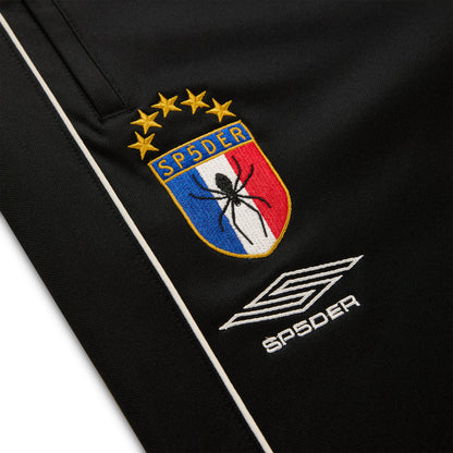 Black ATLANTA TRACK PANT with SP5DER crest logo, white piping, and SP5DER branding.