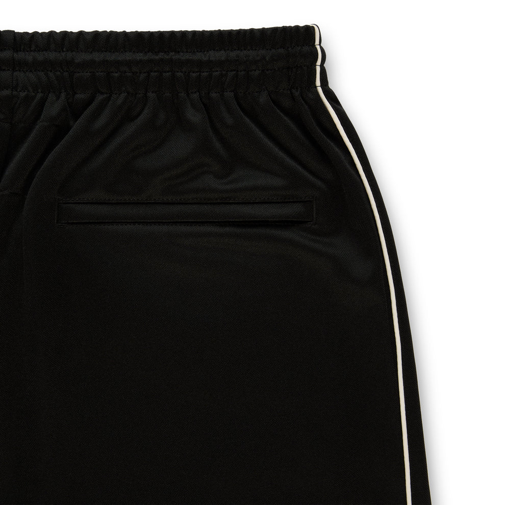 Black polyester track pant with elastic waistband, internal drawcord, and contrast side piping.