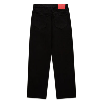 Black V3 DENIM pants, classic straight leg, five-pocket styling, red branded leather back patch.