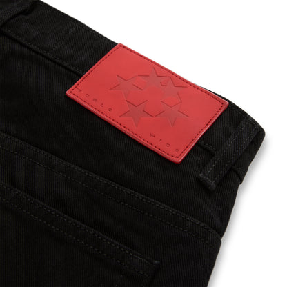 Black V3 denim pant with a red leather back patch featuring embossed stars and "WORLD WIDE".