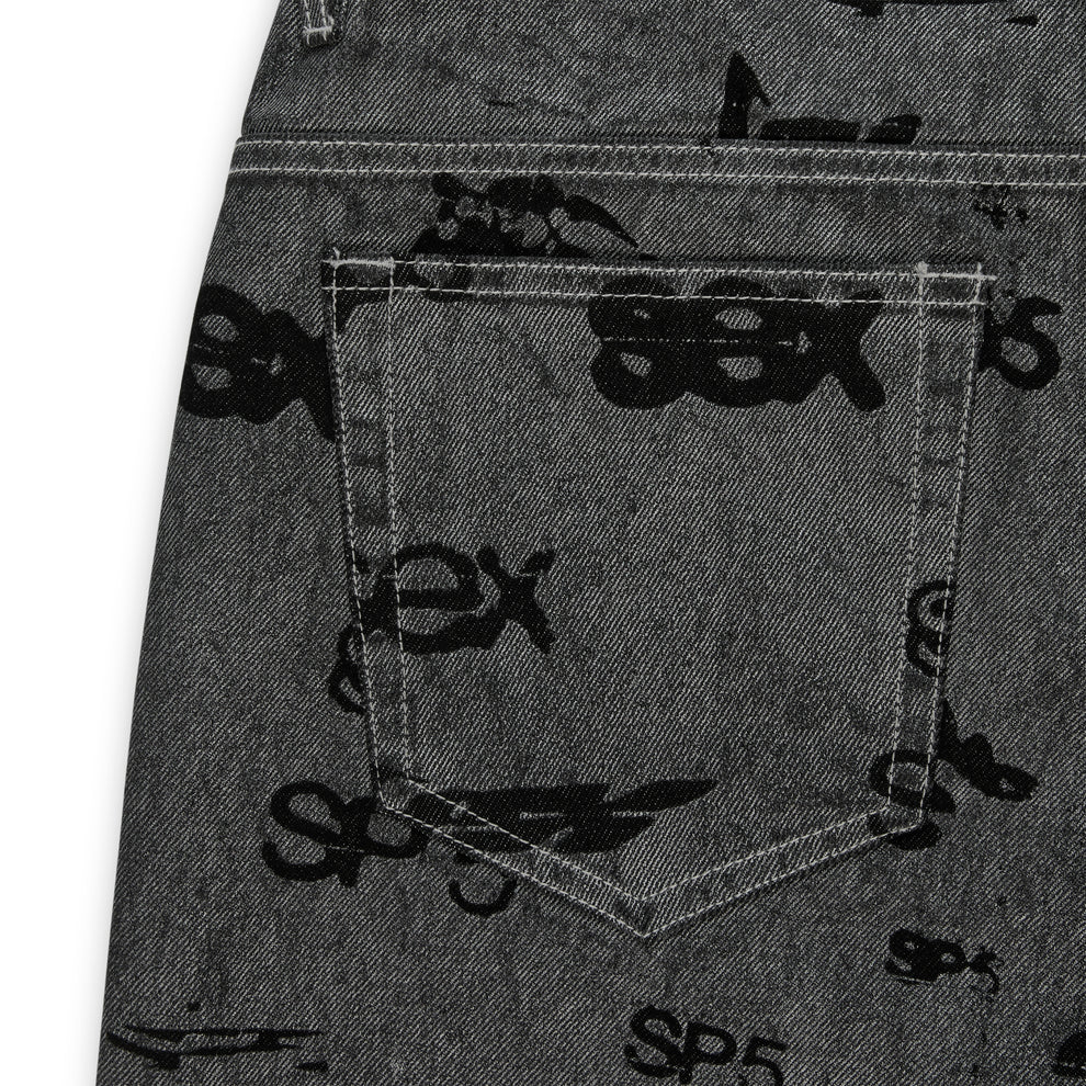 Gray denim pants with black all-over "SEX" print, five-pocket styling, and red contrast stitching.