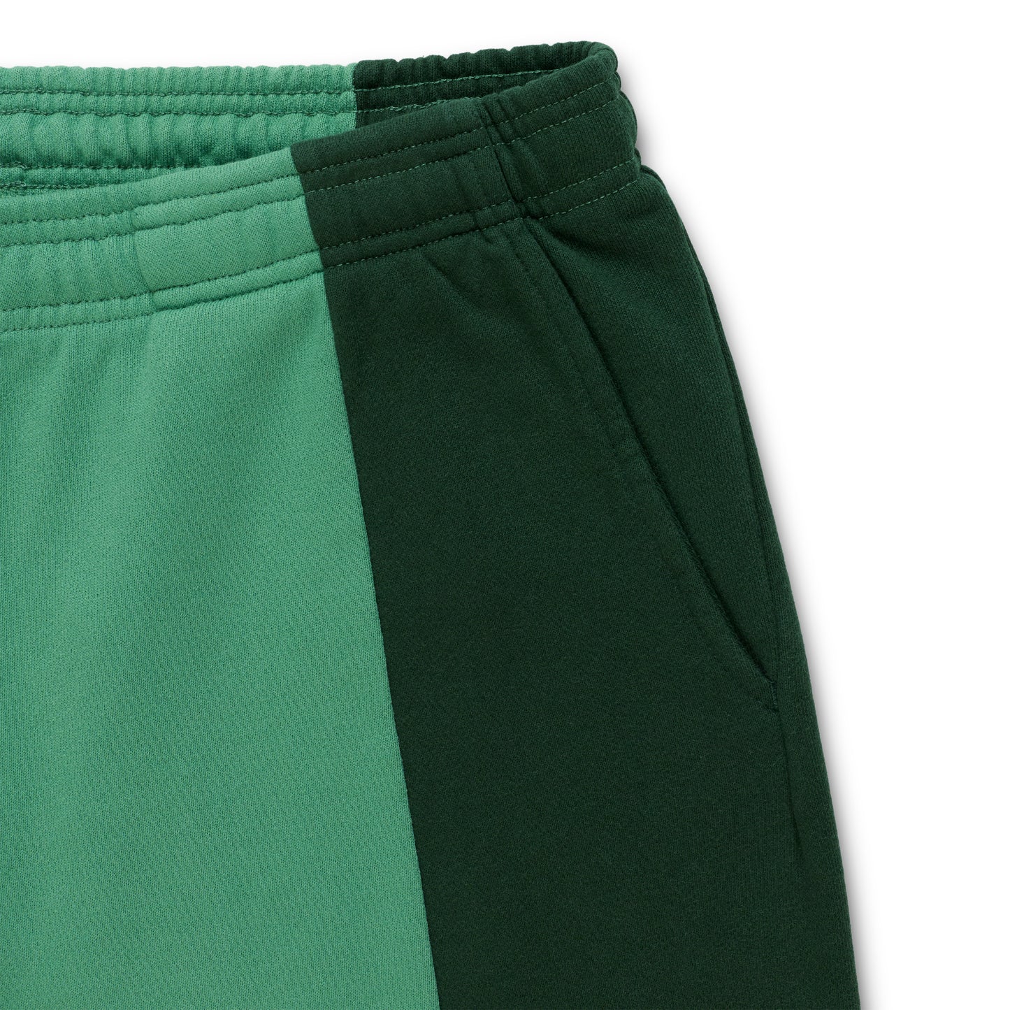 SUPERFIVE SWEATPANT: Two-tone green 13oz cotton fleece sweatpant with contrast paneling and elasticized waistband.