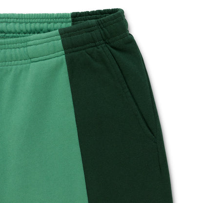 SUPERFIVE SWEATPANT: Two-tone green 13oz cotton fleece sweatpant with contrast paneling and elasticized waistband.
