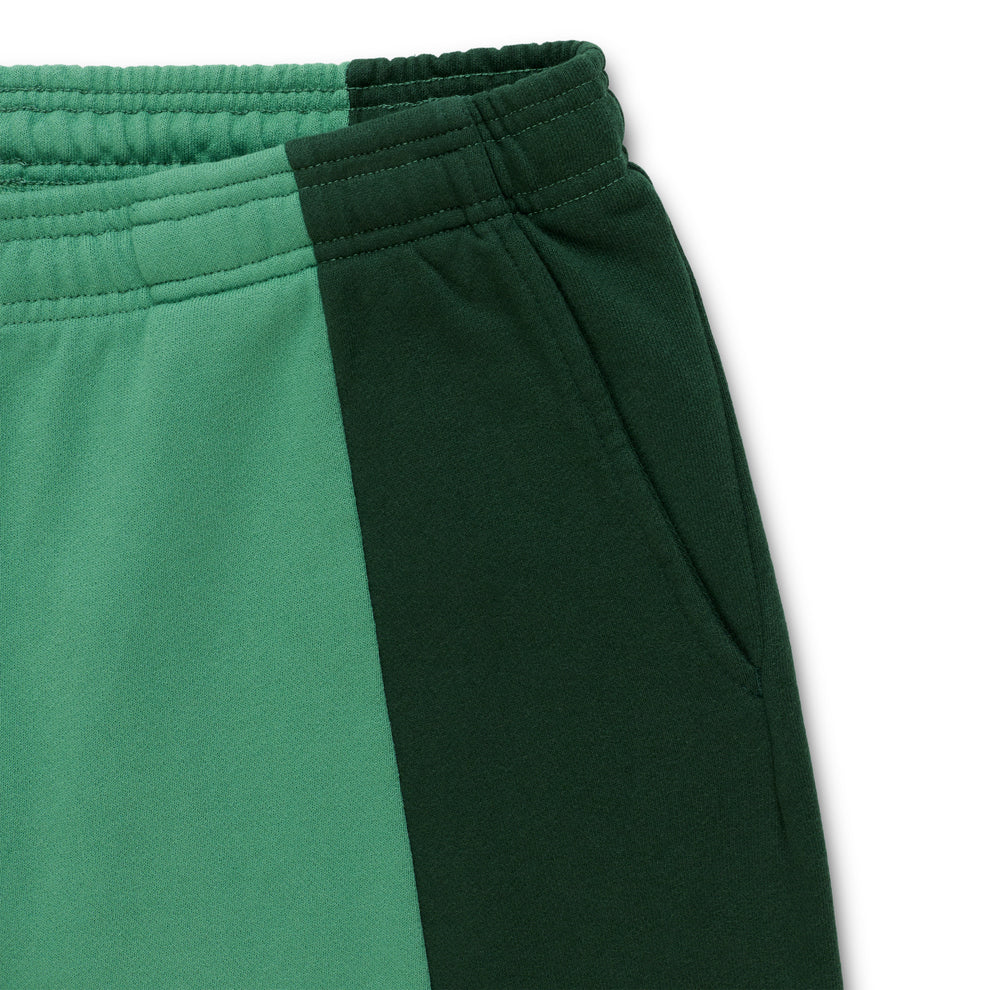 SUPERFIVE SWEATPANT: Two-tone green 13oz cotton fleece sweatpant with contrast paneling and elasticized waistband.