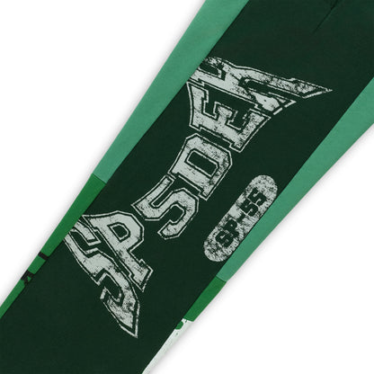 SUPERFIVE green cotton fleece sweatpants with contrast panels and distressed graphic print.