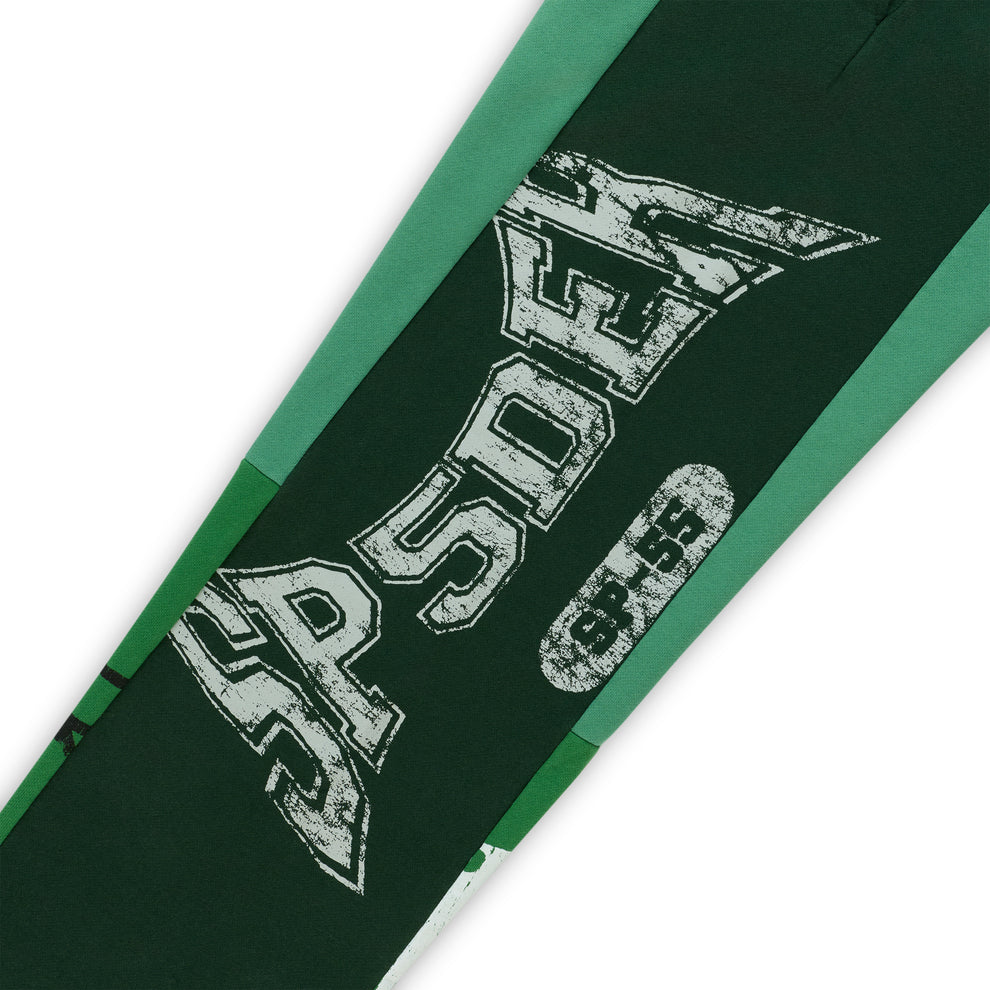 SUPERFIVE green cotton fleece sweatpants with contrast panels and distressed graphic print.