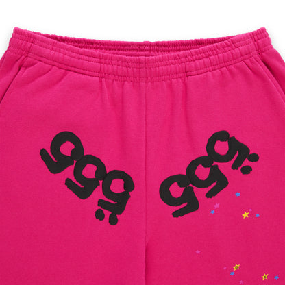 Pink fleece sweatpants with black puff print '555' angel numbers and scattered star print.