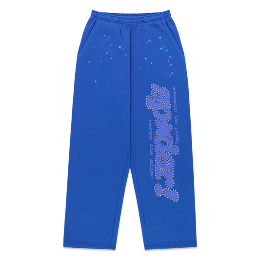 Blue RHINESTONE PUNK V2 SWEATPANT with silver studs forming "whatever" and "nevermind the punks" text, plus scattered star rhinestones.