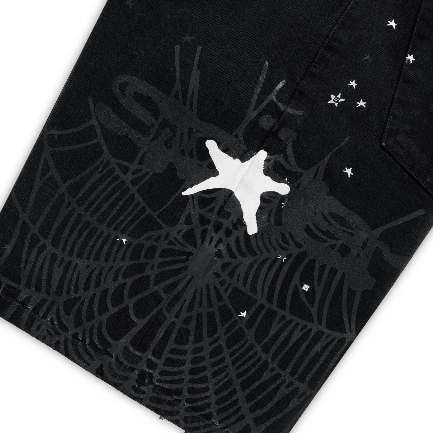 Black denim jean short with a large black spiderweb graphic and a white star.