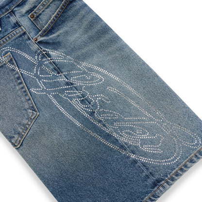 Blue denim short with a large, intricate rhinestone web design on the back.