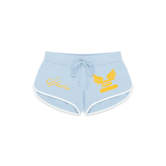 Light blue SP5 WIDE BOXER shorts with white trim, drawstring waist, and yellow graphic print.
