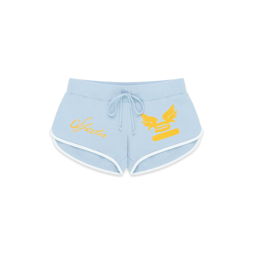 Light blue SP5 WIDE BOXER shorts with white trim, drawstring waist, and yellow graphic print.