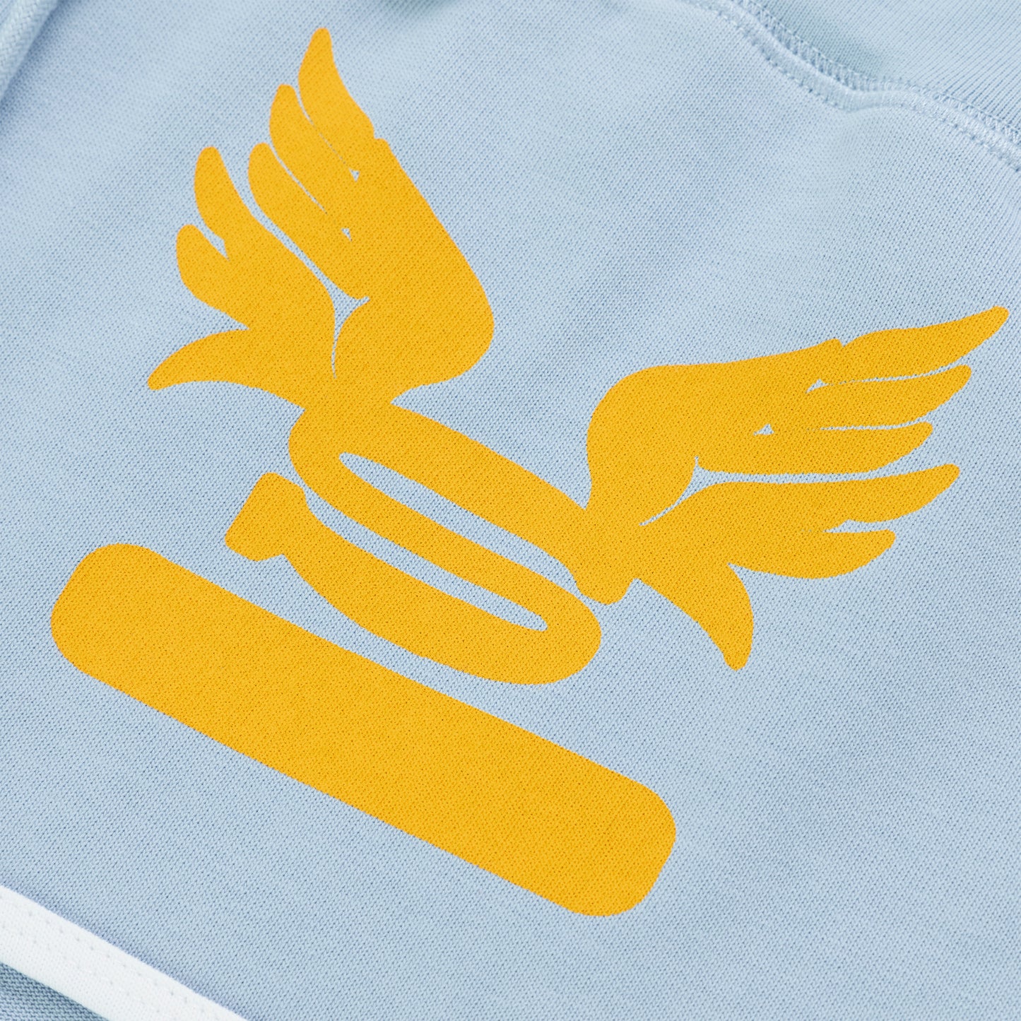 Light blue SP5 WIDE BOXER with a large yellow winged logo and bar graphic.