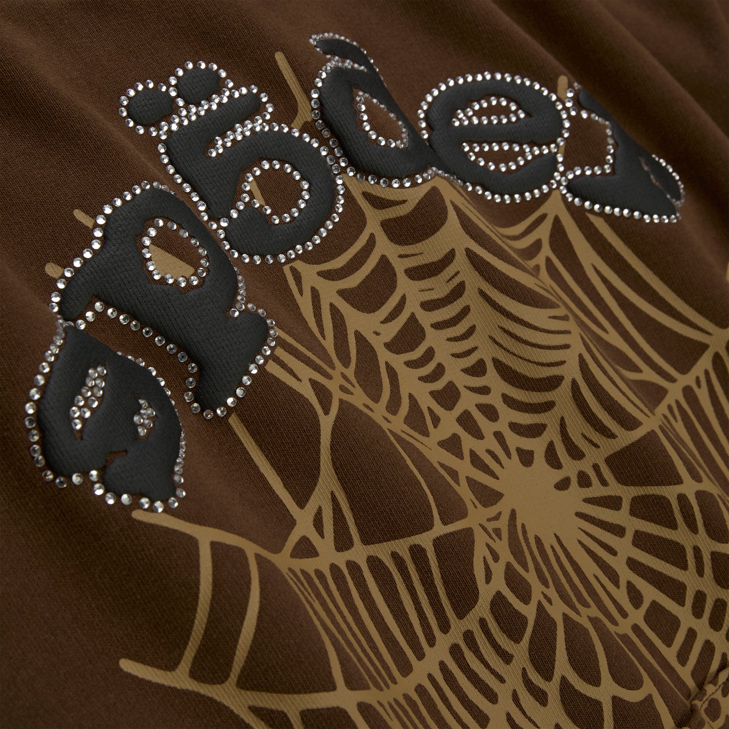 Brown cotton fleece hoodie with rhinestone "Spider" text and tan spider web design.